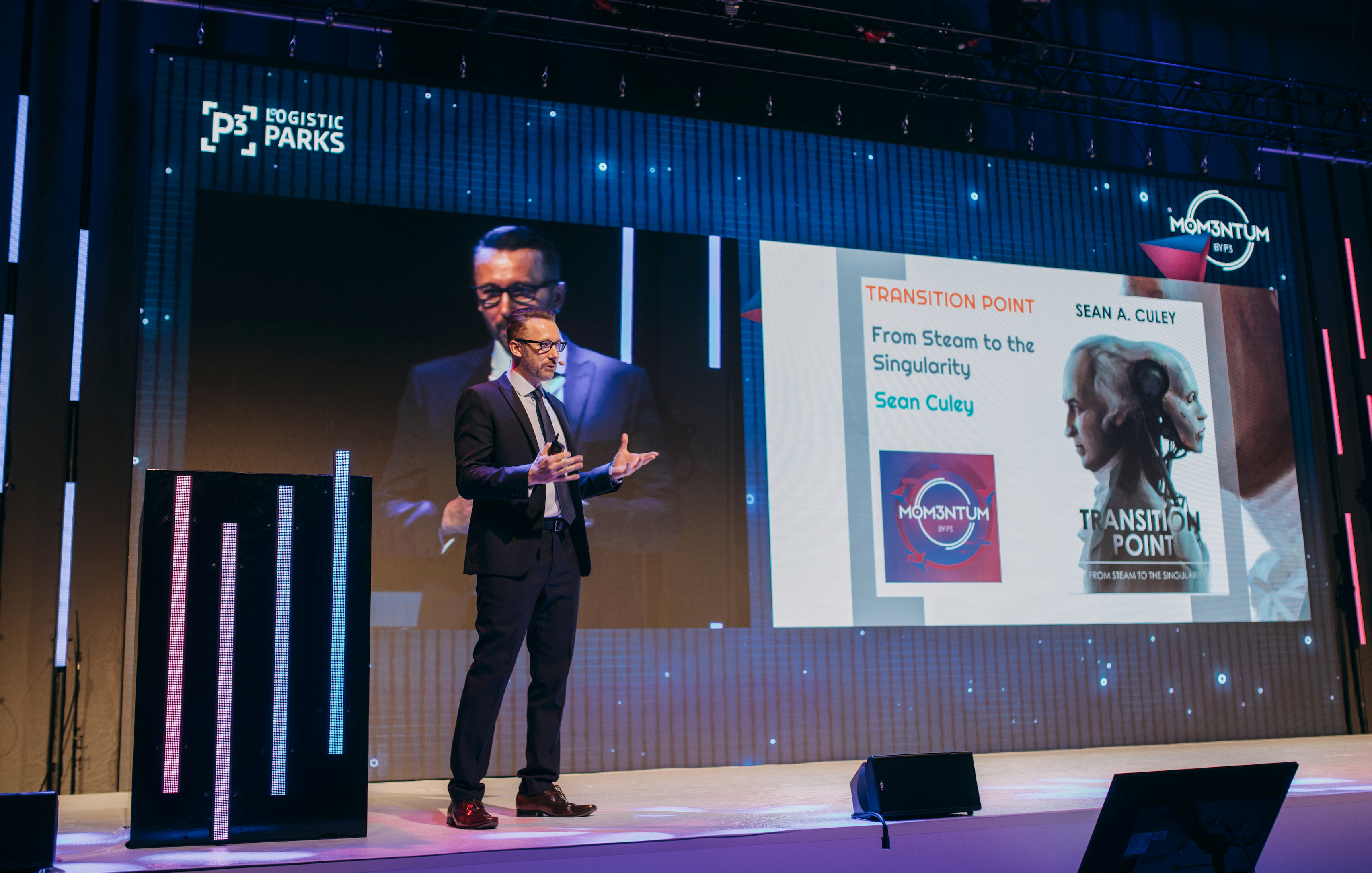 Sean Culey speaking on stage at the B3 Conference